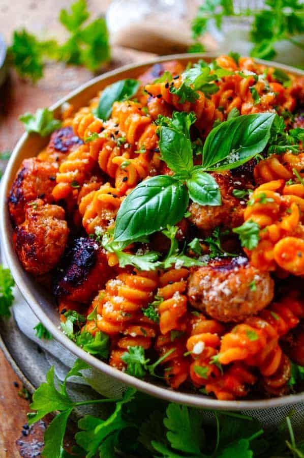 Pasta with pumpkin sauce and meatballs