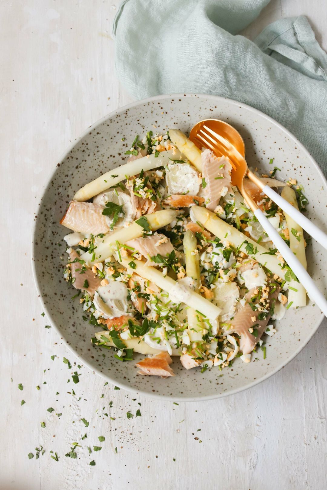Potato salad with asparagus and smoked trout