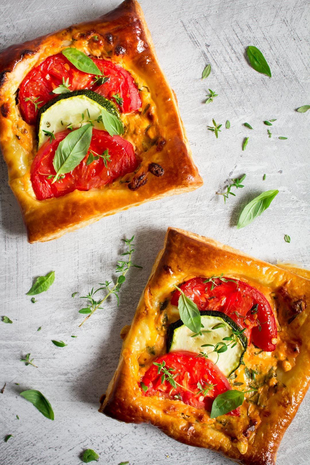 Savory pies with zucchini and tomato