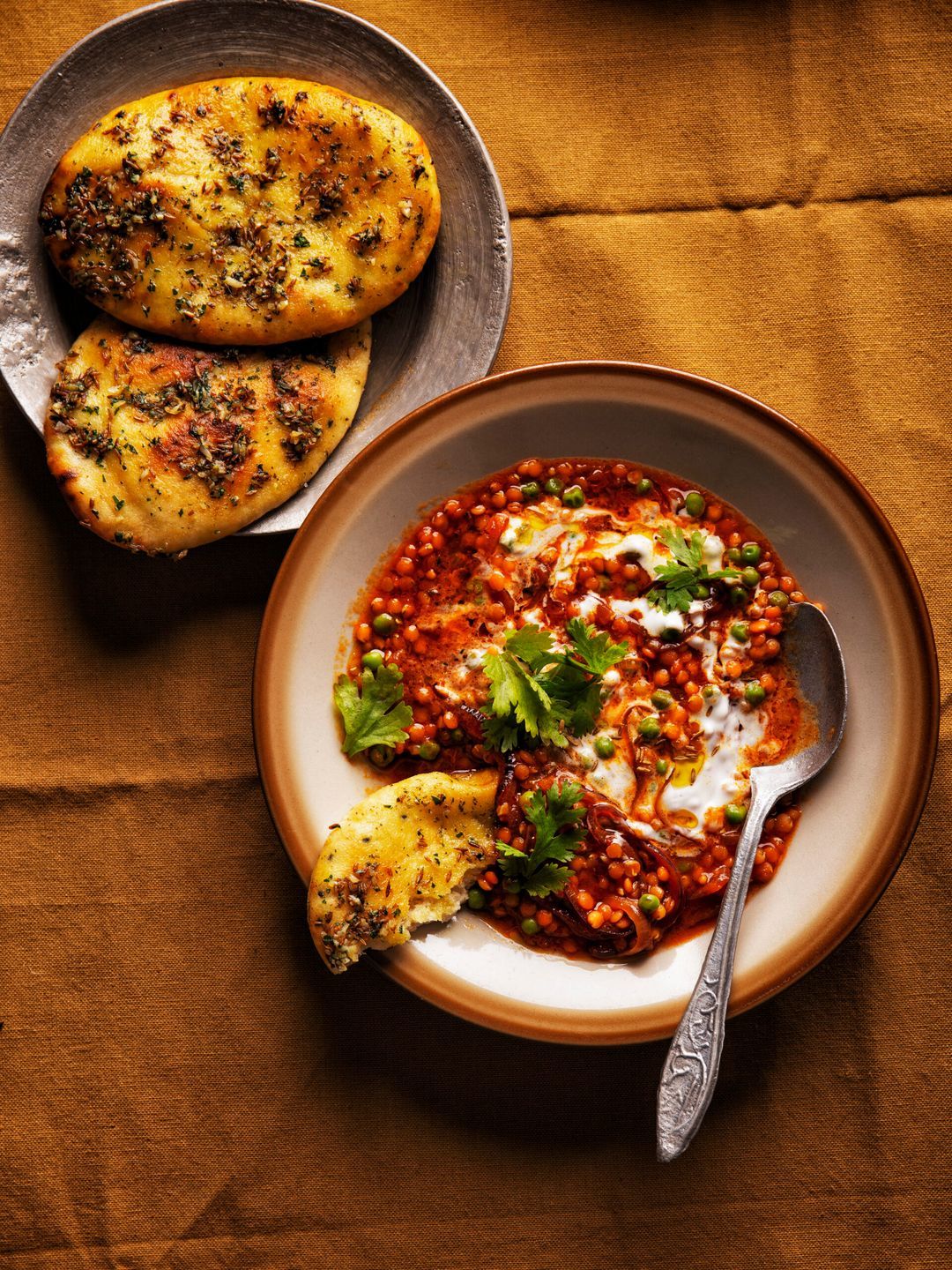 Dahl with tomato, yogurt and cumin naan