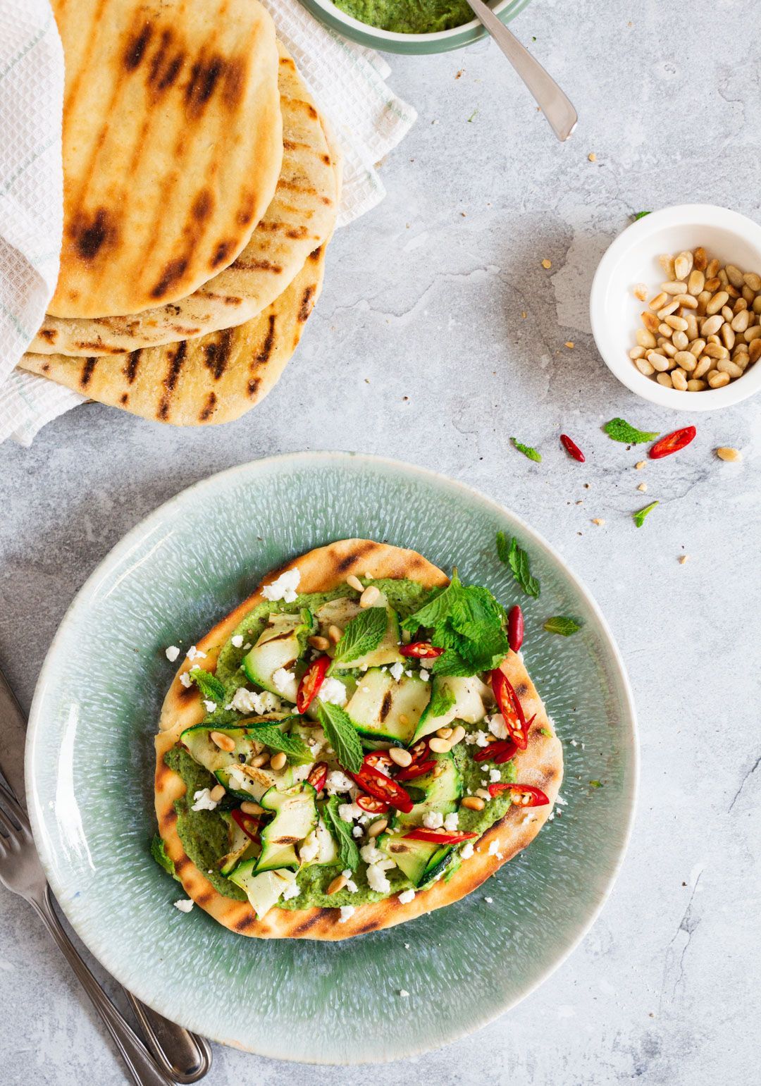 Homemade flatbread with zucchini, feta and mint