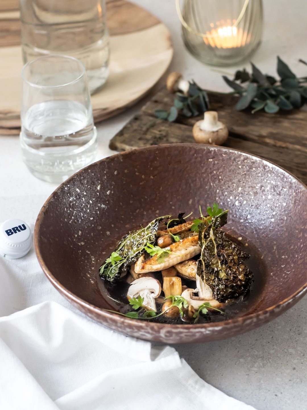 Pieterman with mushroom broth and crispy green cabbage
