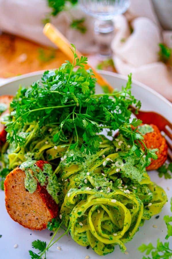 Pasta with meatballs and herb sauce