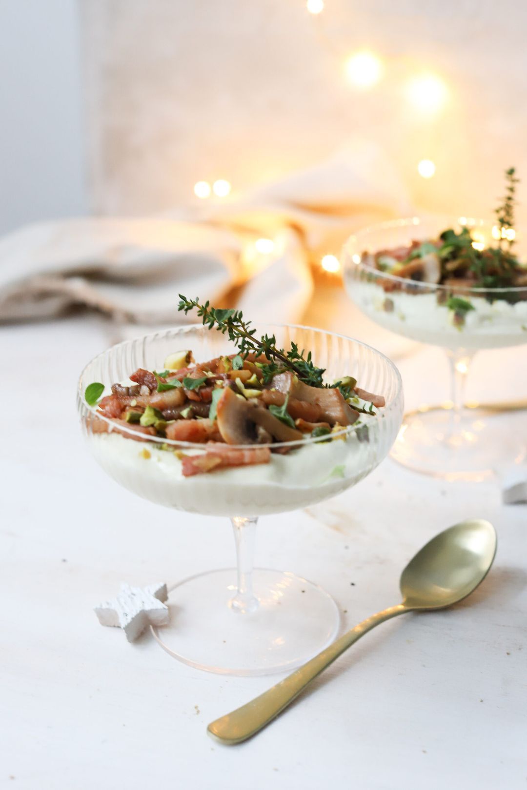 Savory parsnip panna cotta with bacon crumble, mushrooms and pistachio