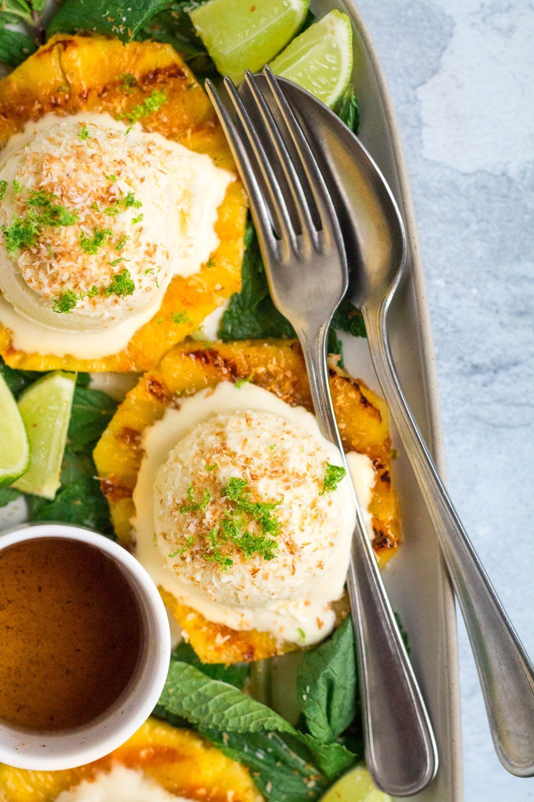 Coconut ice cream with grilled pineapple and lime syrup