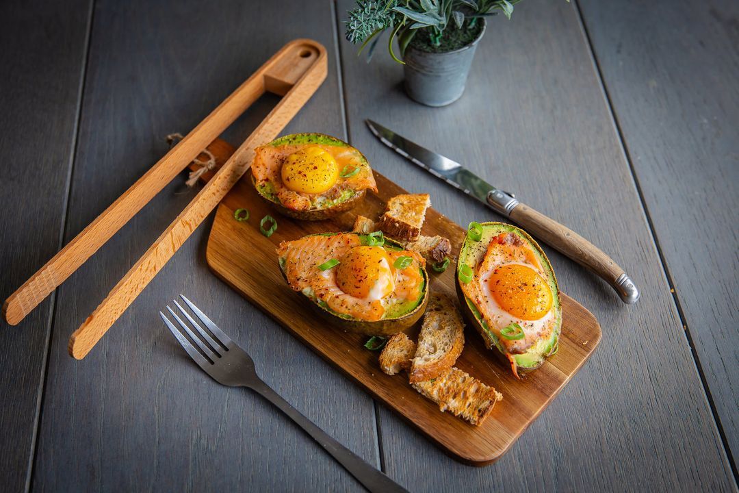 Avocado nests with salmon and egg