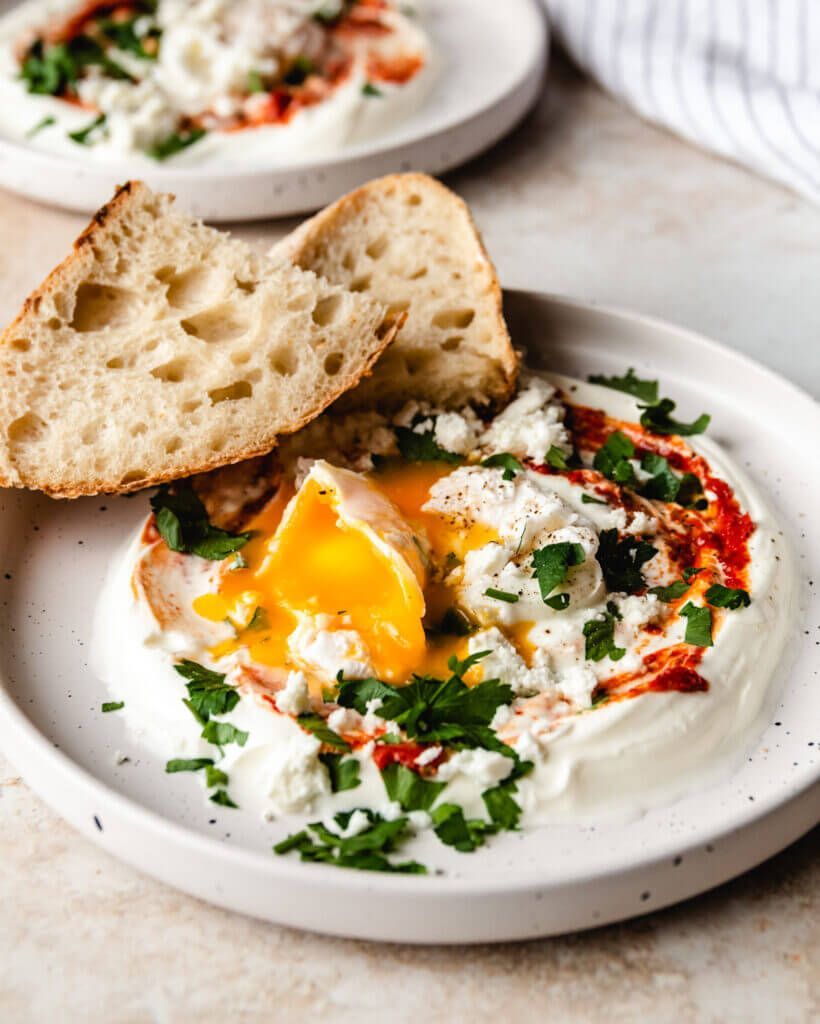 Turkish eggs with yogurt and harissa