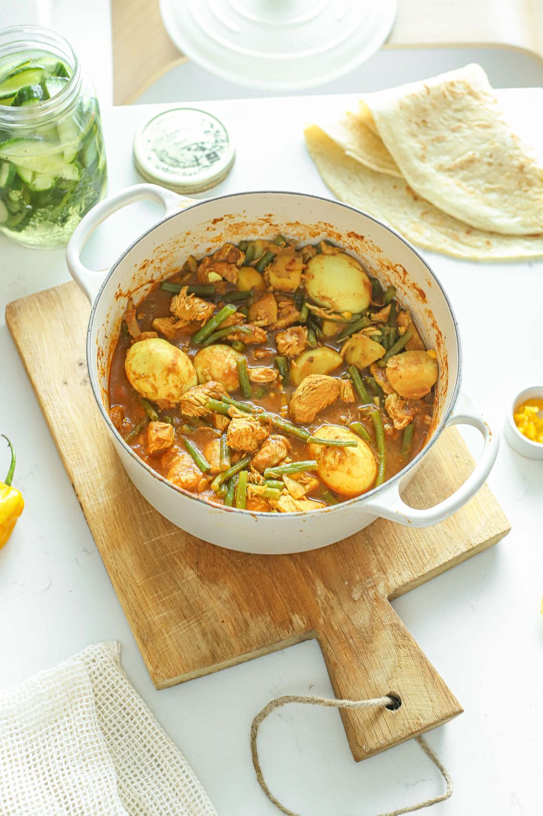 Surinamese roti chicken, egg, beans and sour cucumber