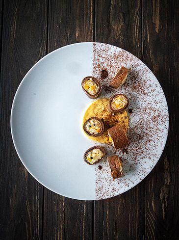 Chocolate pancake filled with condé rice and chocolate sauce