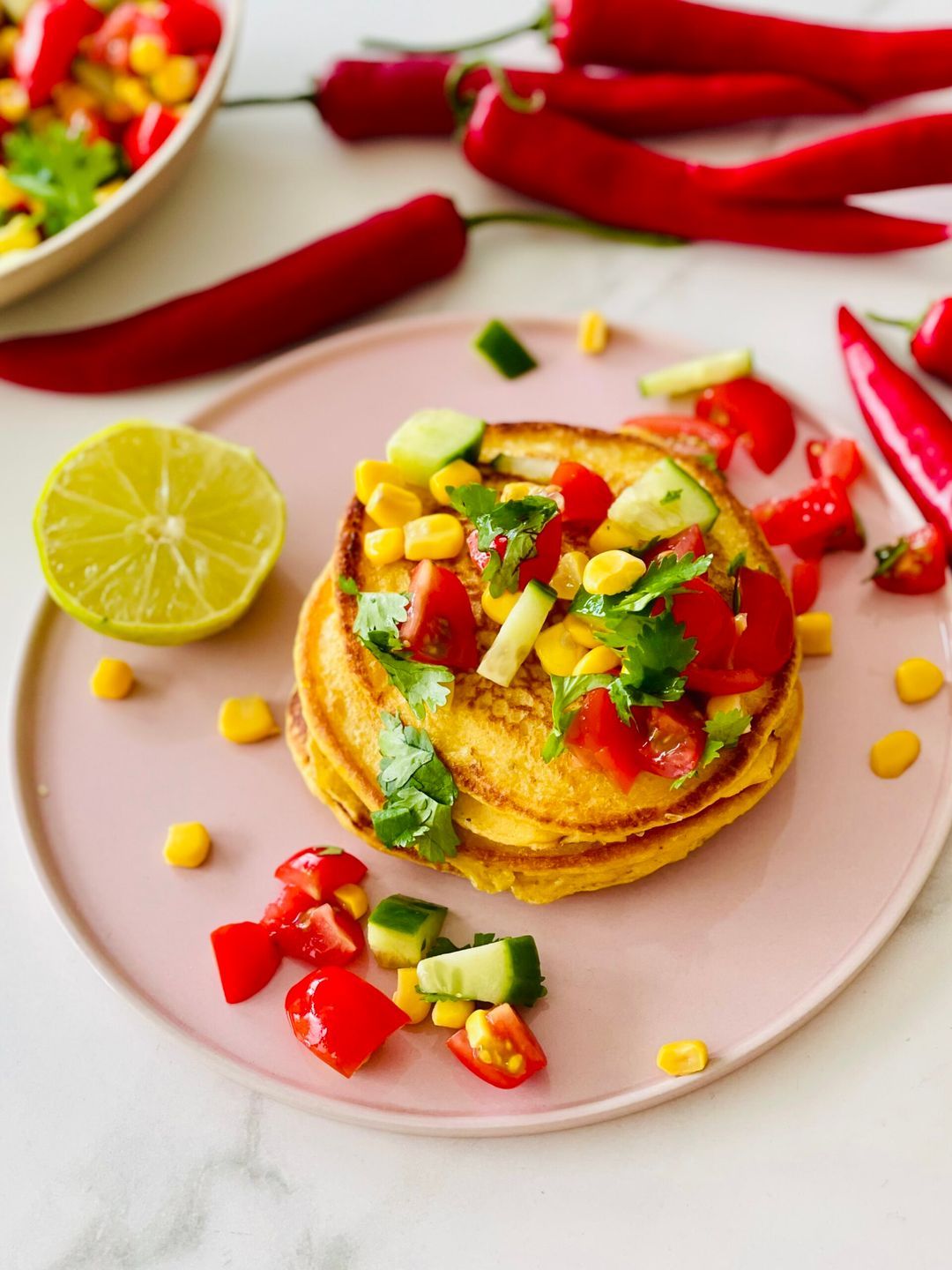 Corn pancakes with tomato salsa