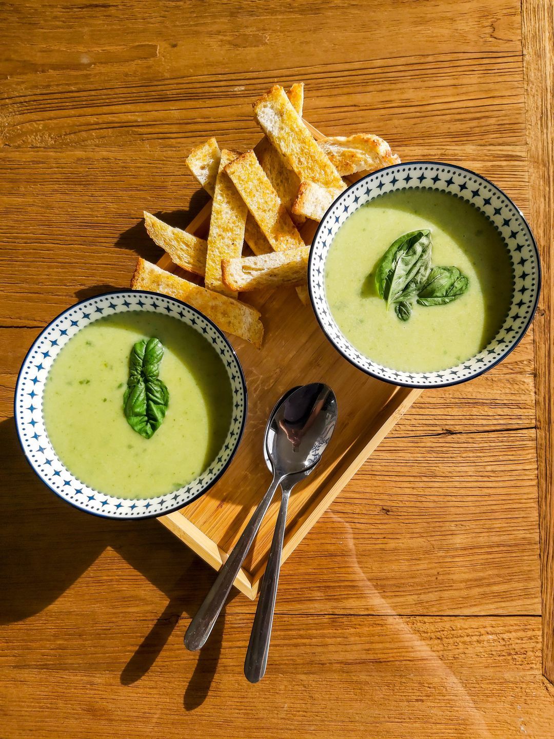 Green spring soup with soldiers